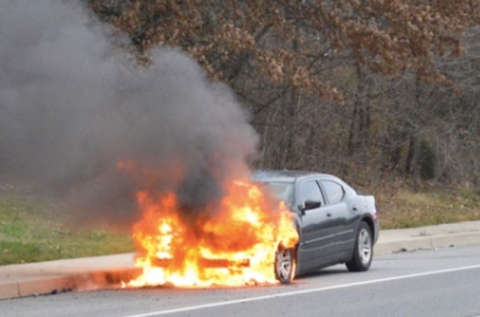 Fire engulfs car — exploding tires and air bags 