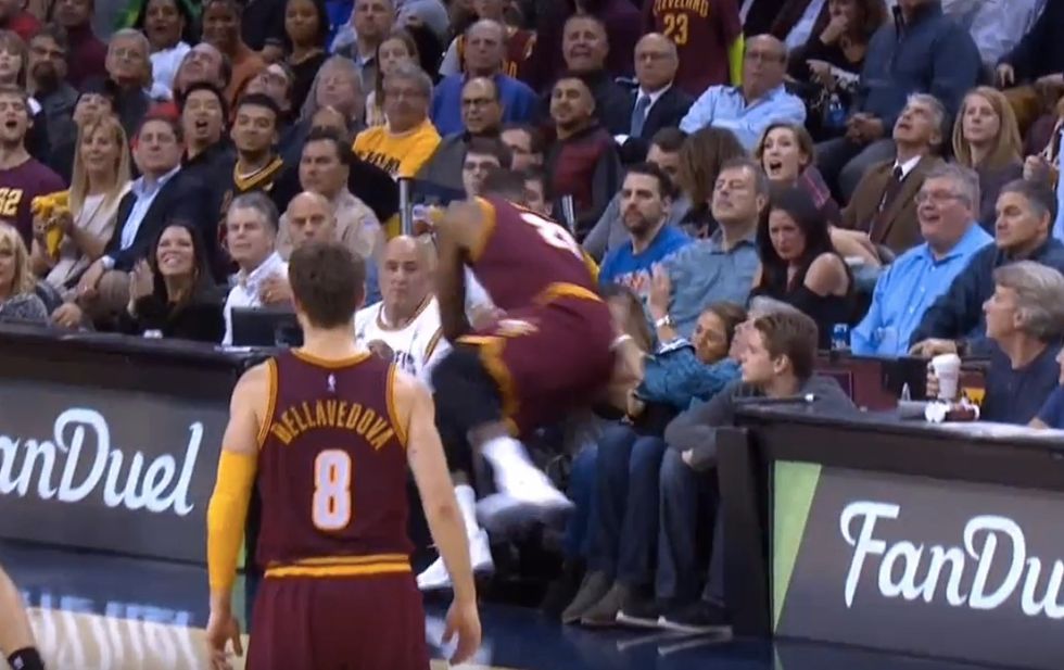 LeBron James Crashes Into Crowd Chasing Loose Ball, Lands on and Injures Wife of Golf Star Jason Day
