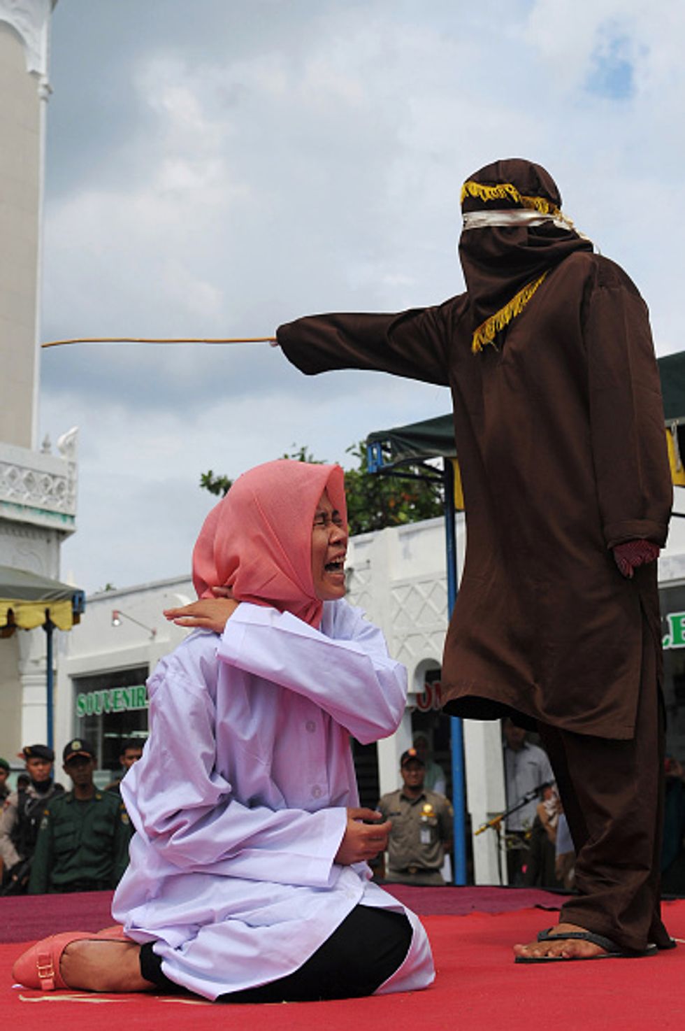 Indonesian Couple Accused of 'Affectionate Contact' Brutally Beaten in Front of Cheering Crowd