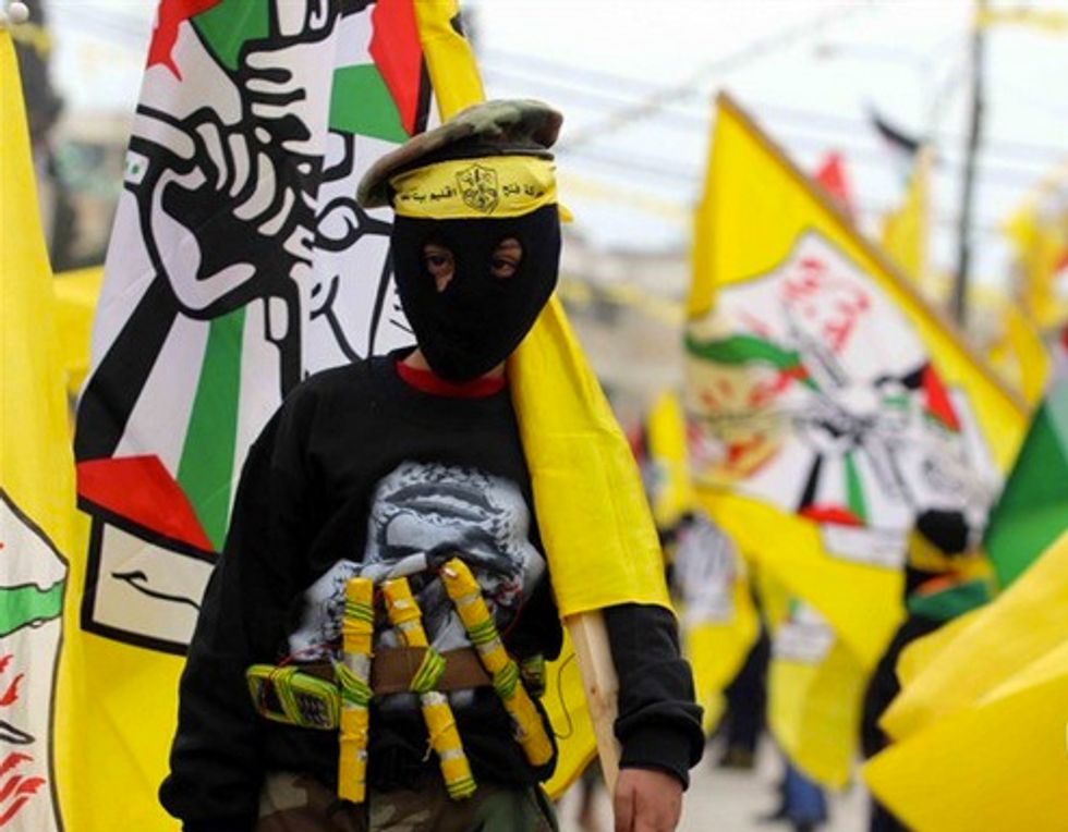 Children Wear Mock Suicide Belts in Large Celebration. Where It Was Held Is Particularly Disturbing.