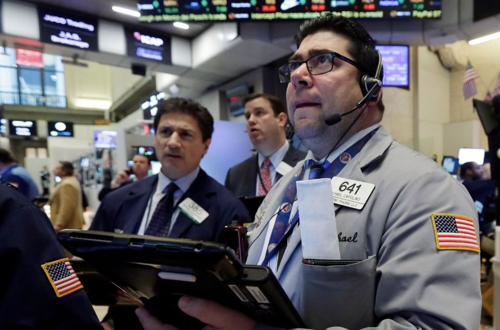Stocks Plunge Along With Price of Oil; Dow Off 500 Points