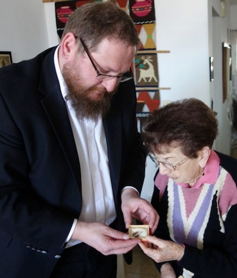 Very Meaningful': Holocaust Survivor Donates the Charm She Secretly Kept While Imprisoned at Auschwitz