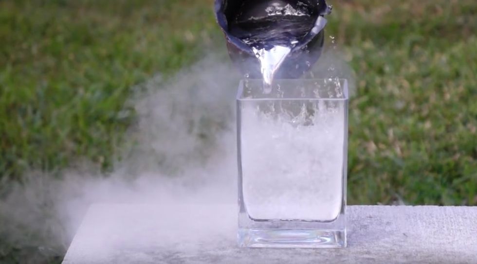 Watch What Happens When Molten Aluminum Is Poured Into Glass of Liquid Nitrogen