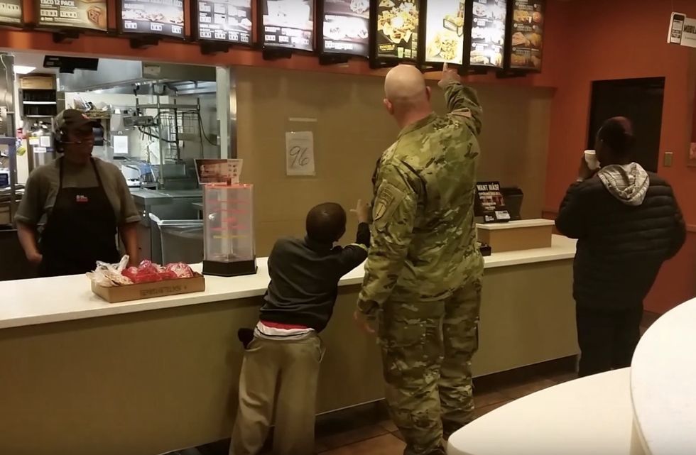 Army Ranger Sees Two Boys Entering Taco Bell 'Soaking Wet' From the Rain and Trying to Sell Stuff. Video Captures What He Ends Up Purchasing Instead.