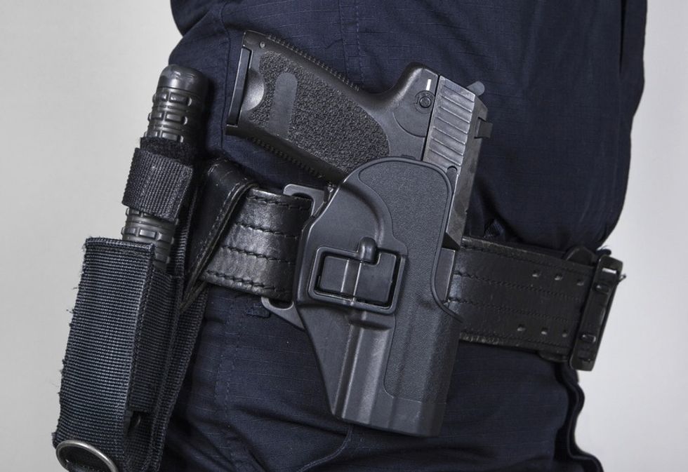 Care to Guess Why a Cop Who's Also a College Student Was Escorted From Class? (Hint: He Was in Full Uniform)