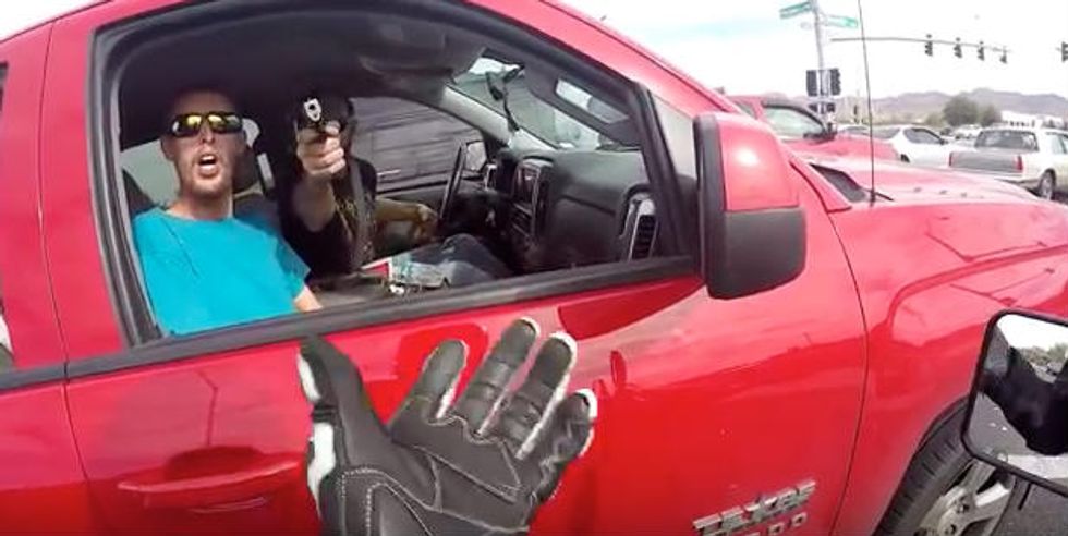 Caught on Video: Road Rage Incident Between Biker and Guys in Pickup Truck Goes From Bad to Worse in an Instant