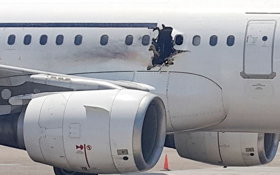 Passenger Sucked Out of Plane at 14,000 Feet After Suspected Bomb Blasts Hole in Side of Jet