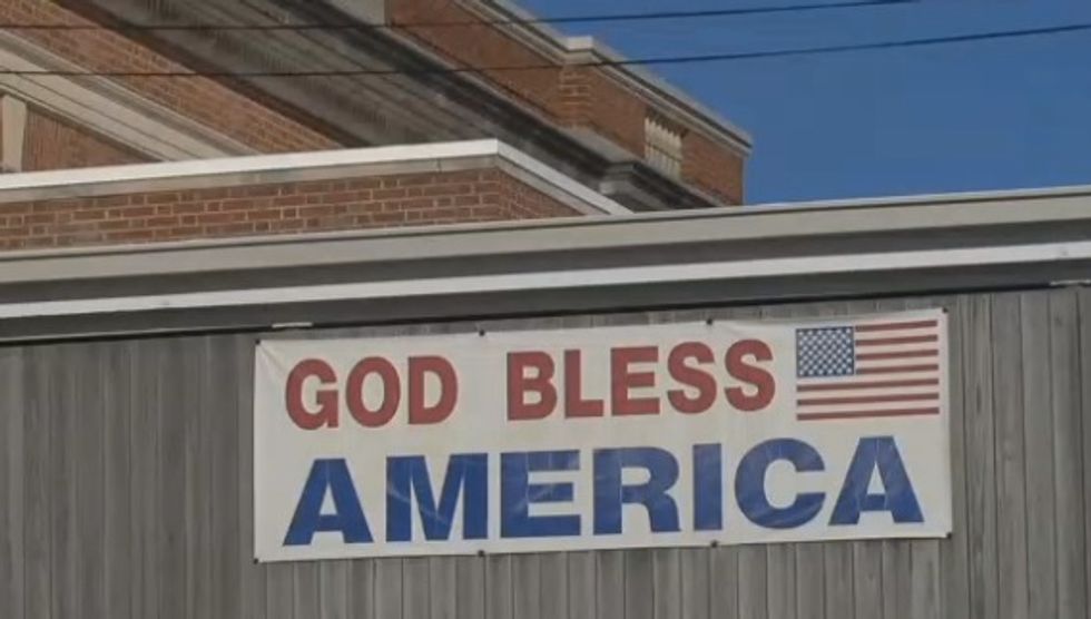 Atheists Forced Post Office to Remove 'God Bless America' Banner. But It's the Community's Response That's Really Sparking Attention.