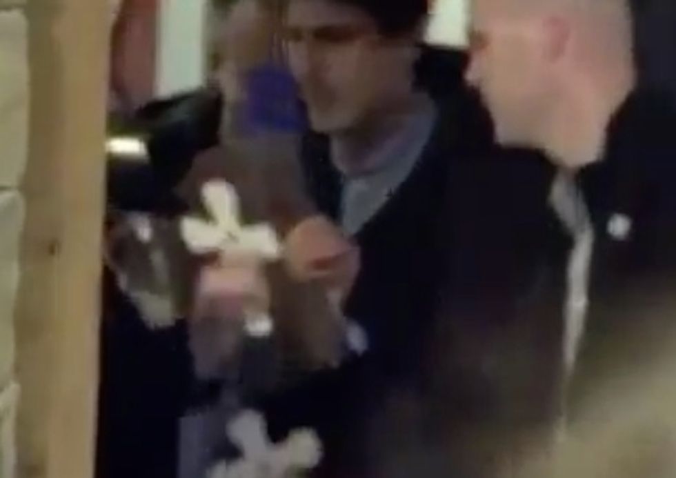 He's Possessed by a Demon!': The Moment Two Men Armed With Crosses and Mirrors Tried to 'Exorcise' Ted Cruz During a Campaign Event