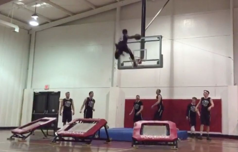 Seven Basketball Players, Three Trampolines, One Monsterous Slam Dunk and a Shattered Backboard