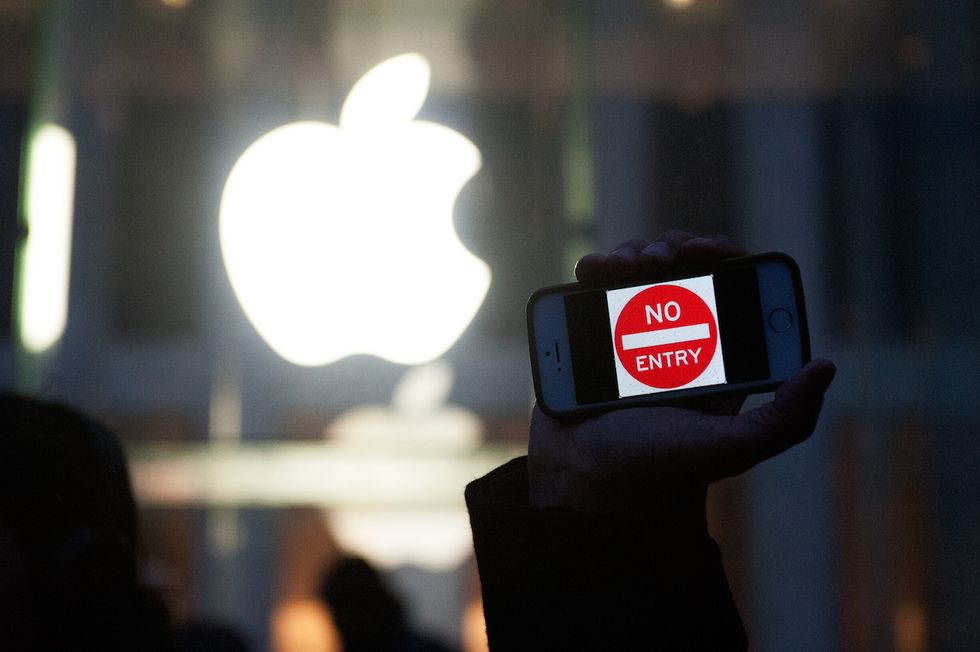 The Government Frets Over an iPhone While Opening Borders to 100,000 Syrians
