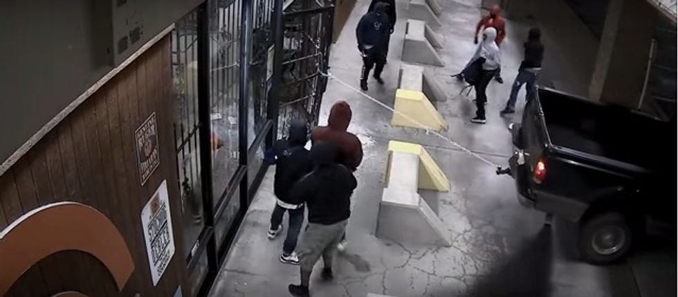 Dramatic Surveillance Video Shows How Much a Pack of Thieves Care About Following Gun Laws