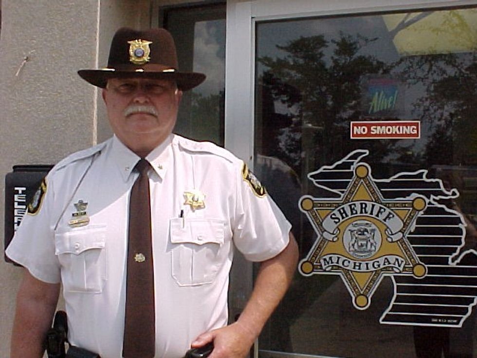 Michigan Sheriff Uses Own Money to Adorn Patrol Cars With This Popular American Phrase