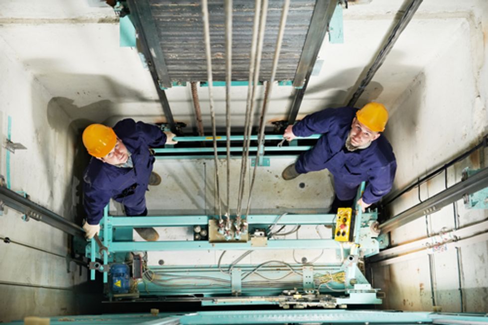 Two Chinese Workers Were In For a Big Surprise After They Unsealed an Elevator One Month After Cutting Off Its Power