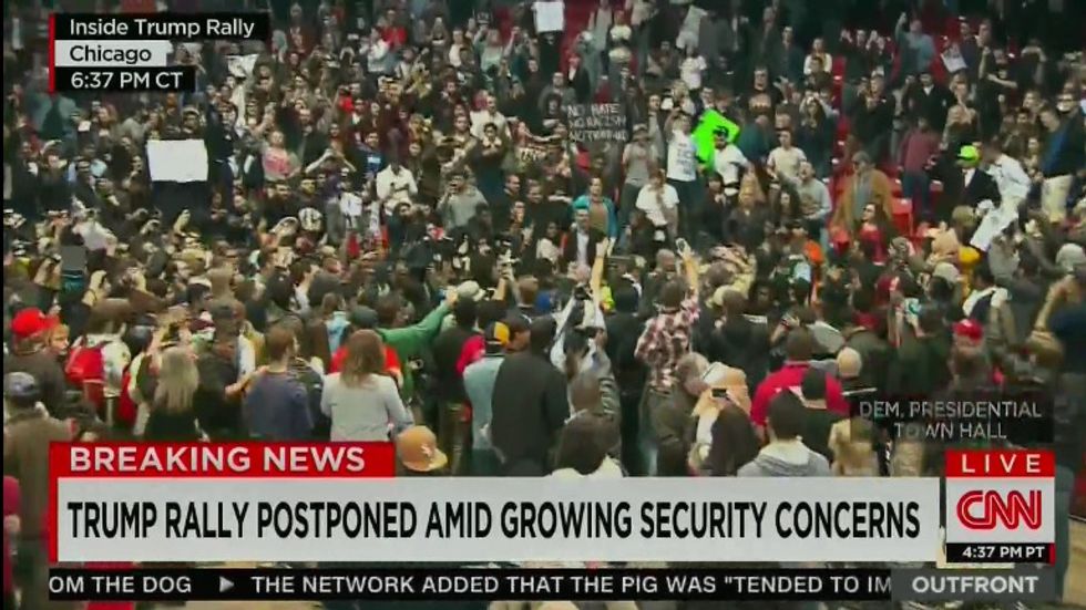 ‘This Is Total Chaos’: Trump Postpones Chicago Rally As Multiple Fights Break Out Inside Arena