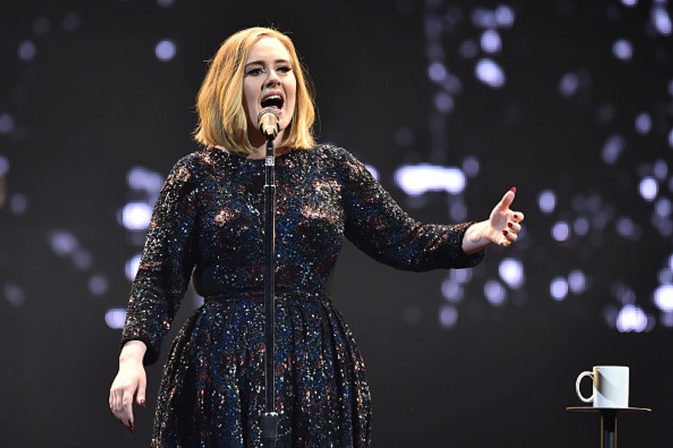 Adele Spots Man Proposing as She Performs 'Make You Feel My Love' and Invites Couple to Join Her Onstage