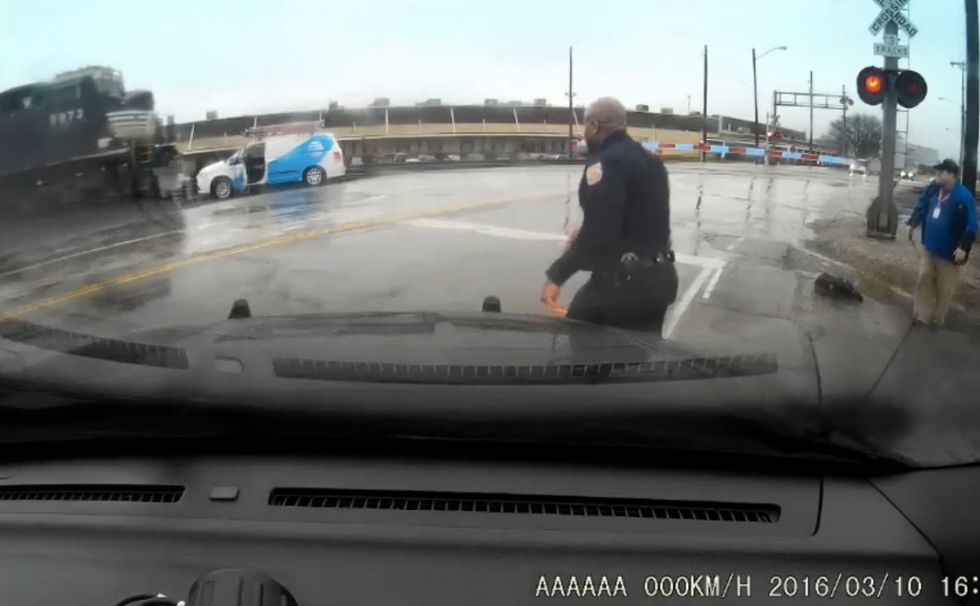 Cop Spots Van Stuck on Railroad Tracks as Train Is Just Seconds From Impact — Dashcam Catches What Happens Next