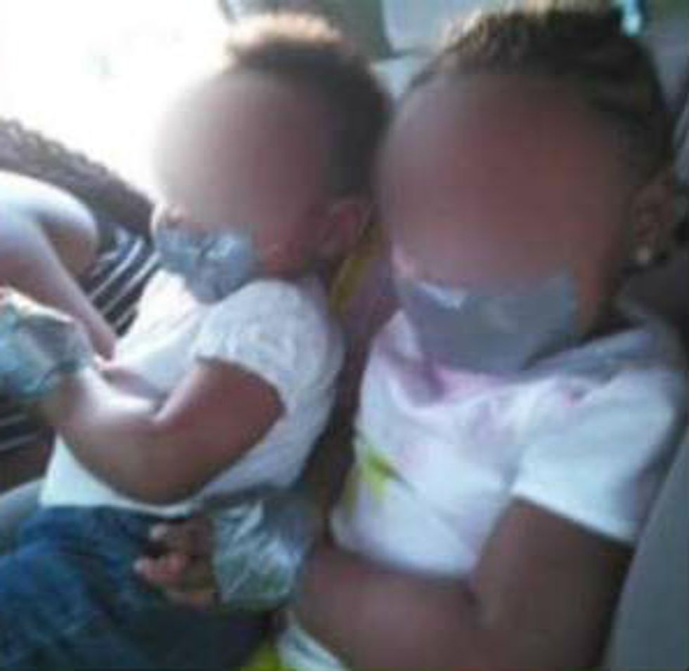 Hands Down Child Abuse': Police Investigate Disturbing Facebook Photo of 'For Sale' Duct-Taped Toddlers