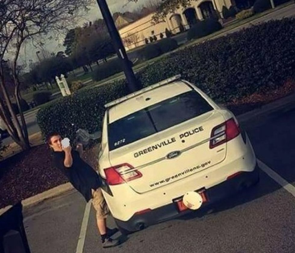 He Gave the Finger Next to a Cop Car and the Photo Went Viral. Then Police Made Him an Offer He Couldn't Refuse.