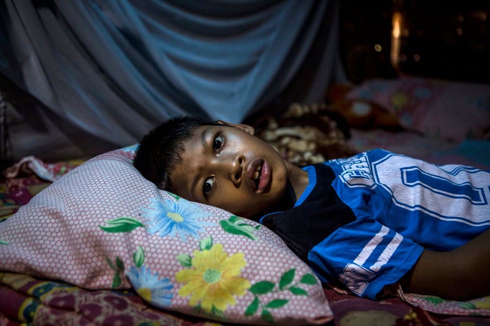 Living in Hell': See How Hundreds of Mentally Ill Indonesian Villagers Live Chained Down, Locked Away
