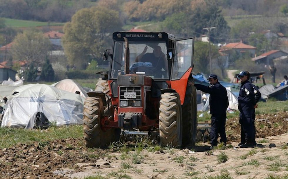 Fed Up With Migrants Pitching Tents on His Property, Greek Farmer Gets to Work on His Tractor and Plow