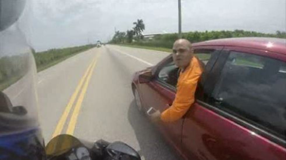 Driver Seemingly Attempts to Run Biker Off the Road Several Times During Intense Road Rage Incident Caught on Helmet Cam
