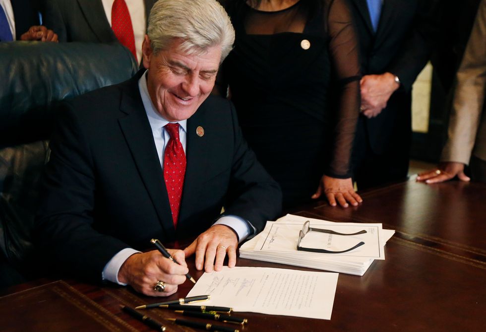 Mississippi Governor Signs Law Allowing Businesses to Refuse Service to Gay Couples