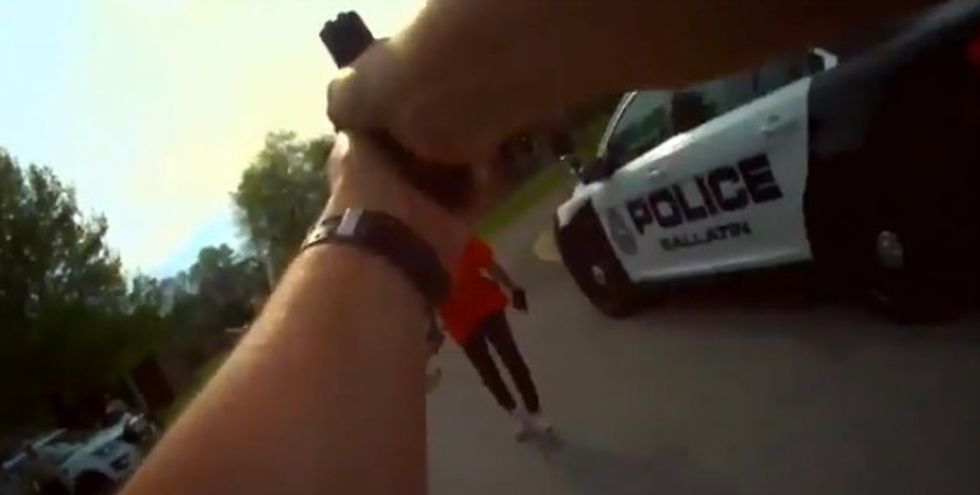 Intense Body Cam Video Shows How Quickly Officer Must React When Woman Comes at Him With Medieval-Style Ax