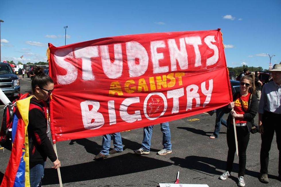 We Are Working Hard to Eradicate the Disease': Why Group of Iowa State Students Are Advising White Peers to 'Head to the Doctor