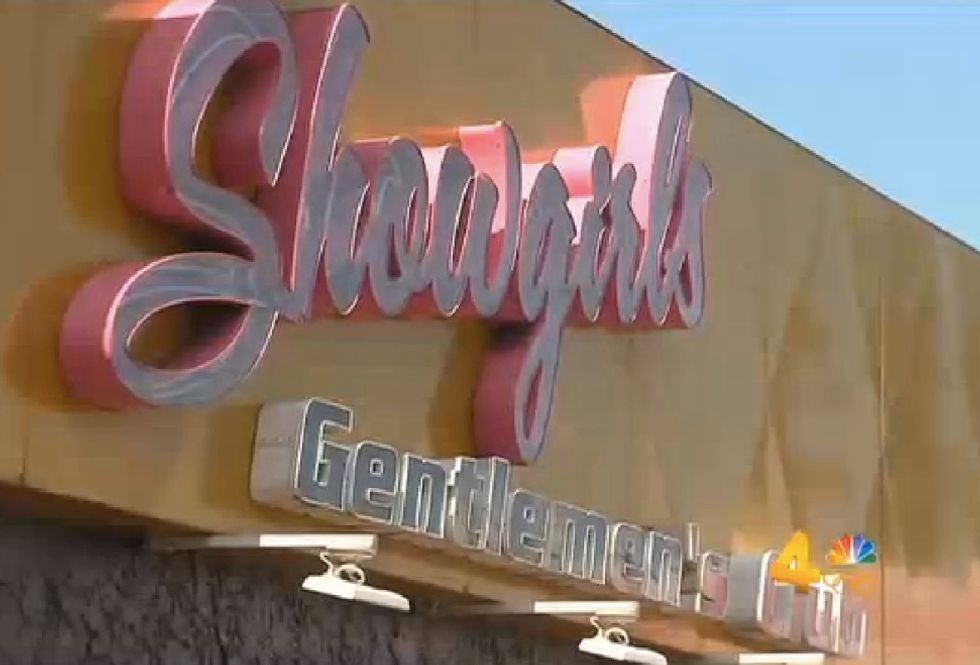 9-Month-Old Girl Rushed to Hospital After Cops Find Her 'Drenched in Sweat' in Car on Warm Day Outside Strip Club. Guess What Mom Allegedly Was Doing.