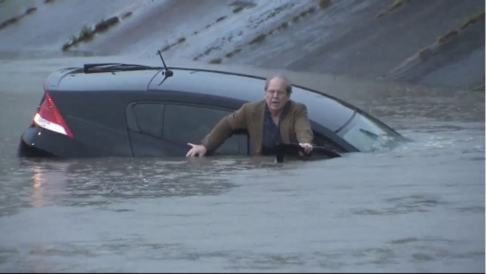 Texas Reporter Covering Houston Flooding Helps Stranded Driver to Dry Land