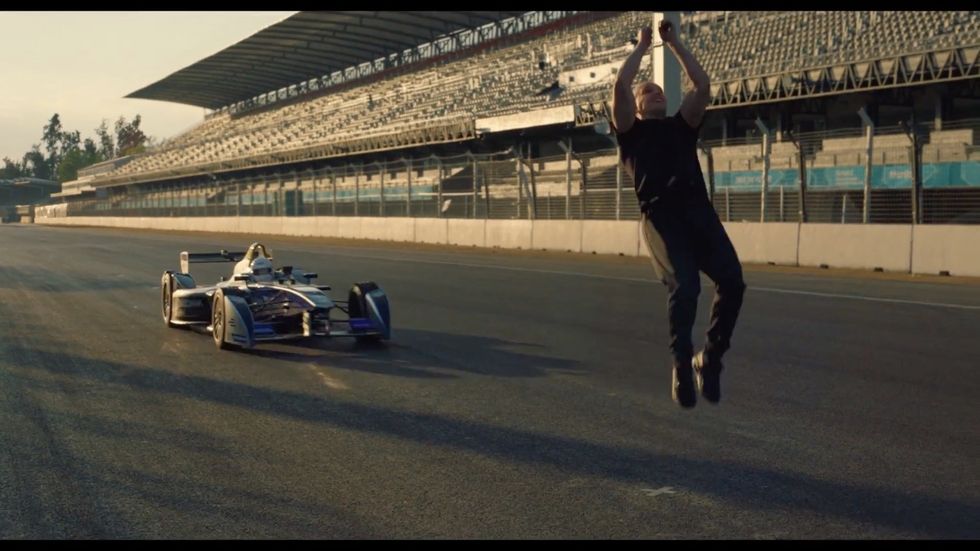 Leap of Faith': Watch Hollywood Stuntman Backflip Over Zooming Race Car in Epic Video
