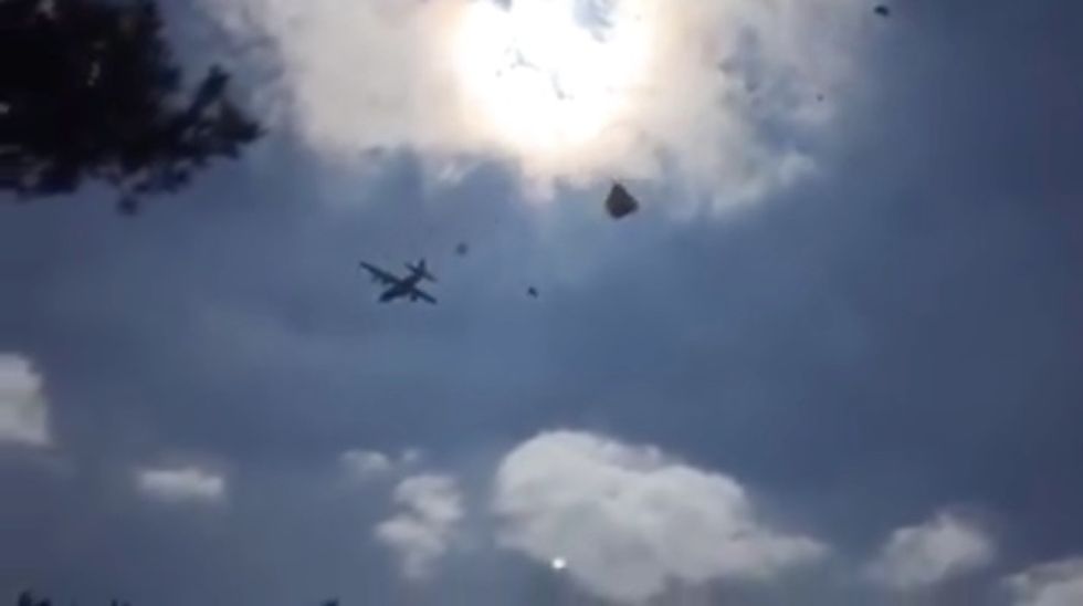 Check Out the Reaction When U.S. Army Humvees Break From Their Parachutes and Plummet to the Ground