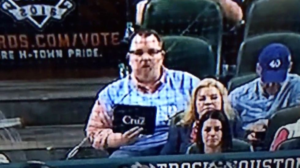 Cruz Campaign Manager Jeff Roe Holds 'Cruz 2016' Sign Behind Home Plate During an ESPN Broadcast