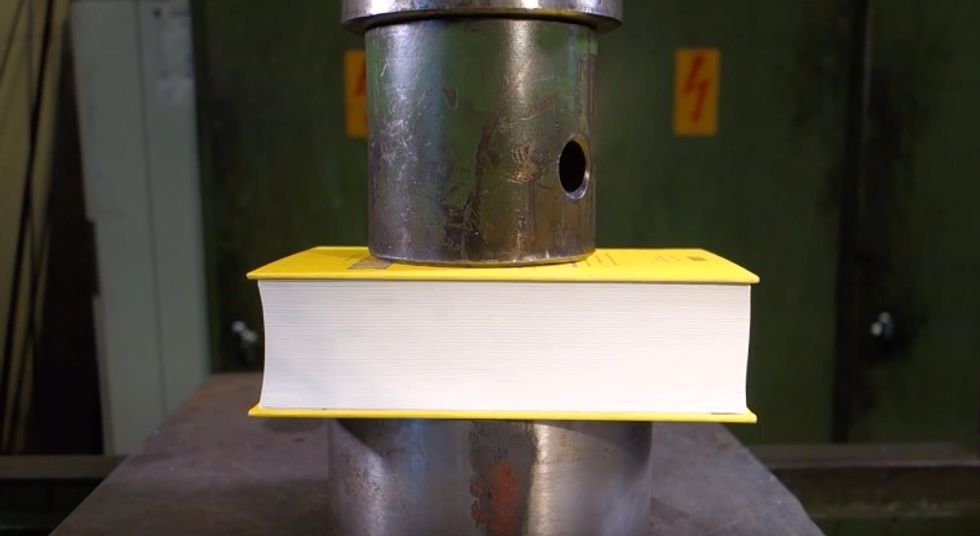 Watch What Happens When Hydraulic Press Attempts to Crush Book