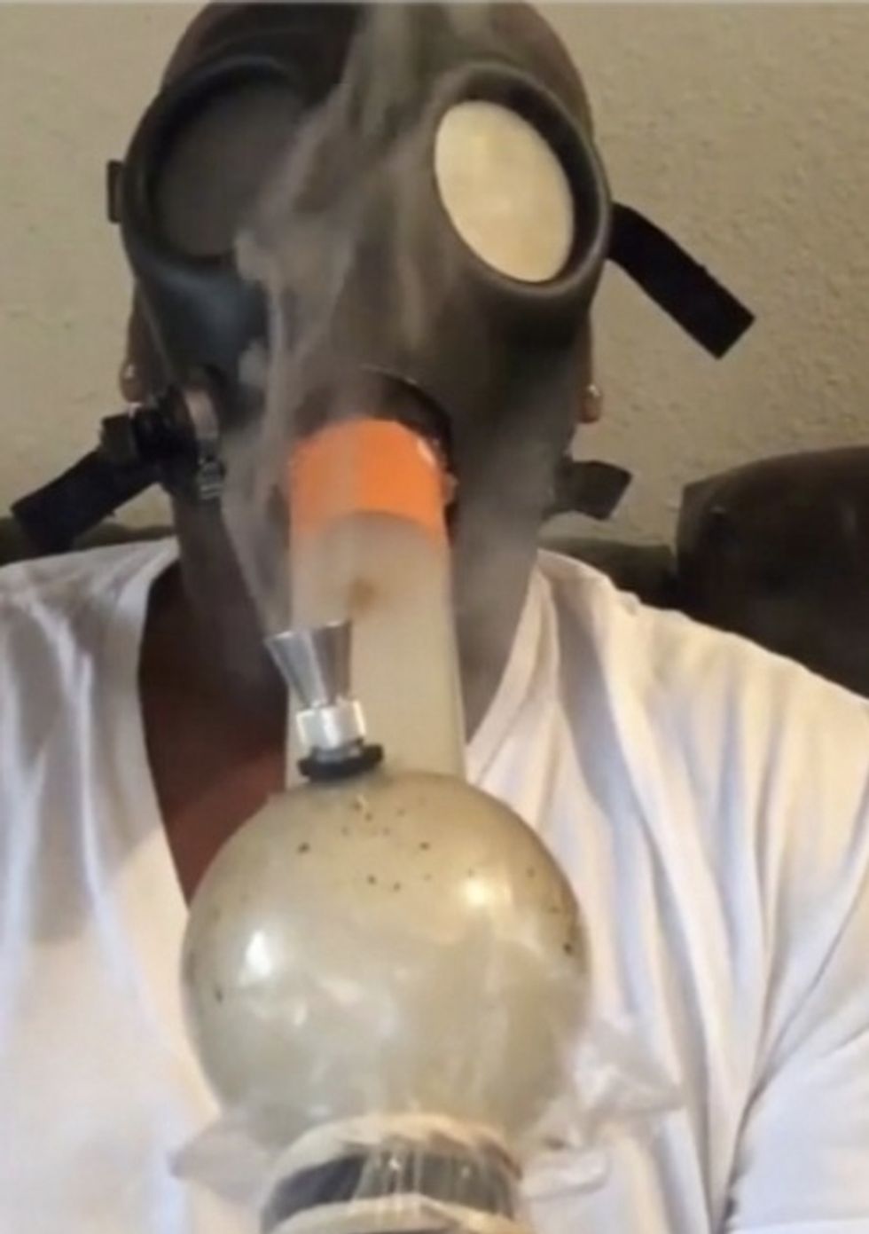 Minutes Before NFL Draft Begins, Bizarre Gas Mask Bong Video Appears on Highly Ranked Prospect's Twitter Account — Guess How Much It May Have Cost Him