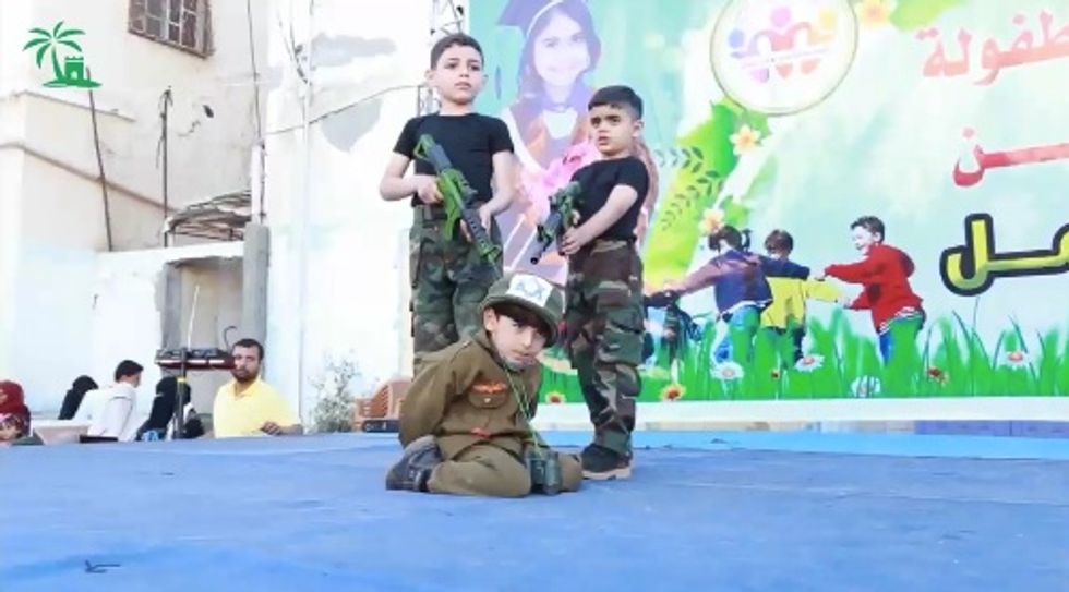 ISIS-Like Brainwashing': Disturbing Kids' Performance Has Gaza Boys Emerge From Tunnel to Stage Mock Execution of Israeli