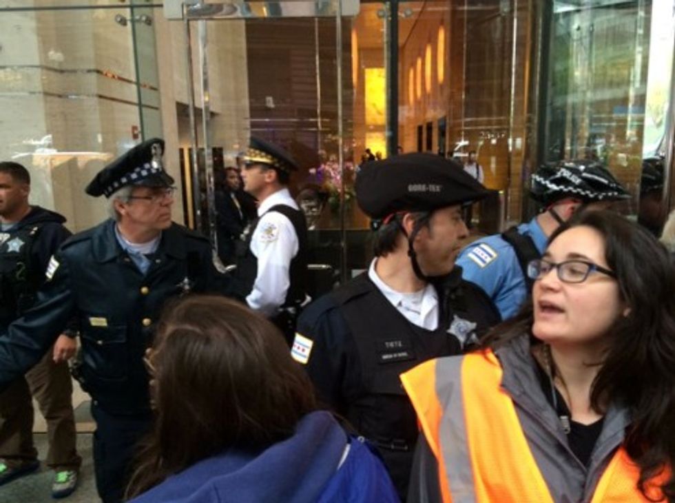 Protesters Demanding Higher Taxes for the Rich Storm Entrance of Chicago Hedge Fund Headquarters 