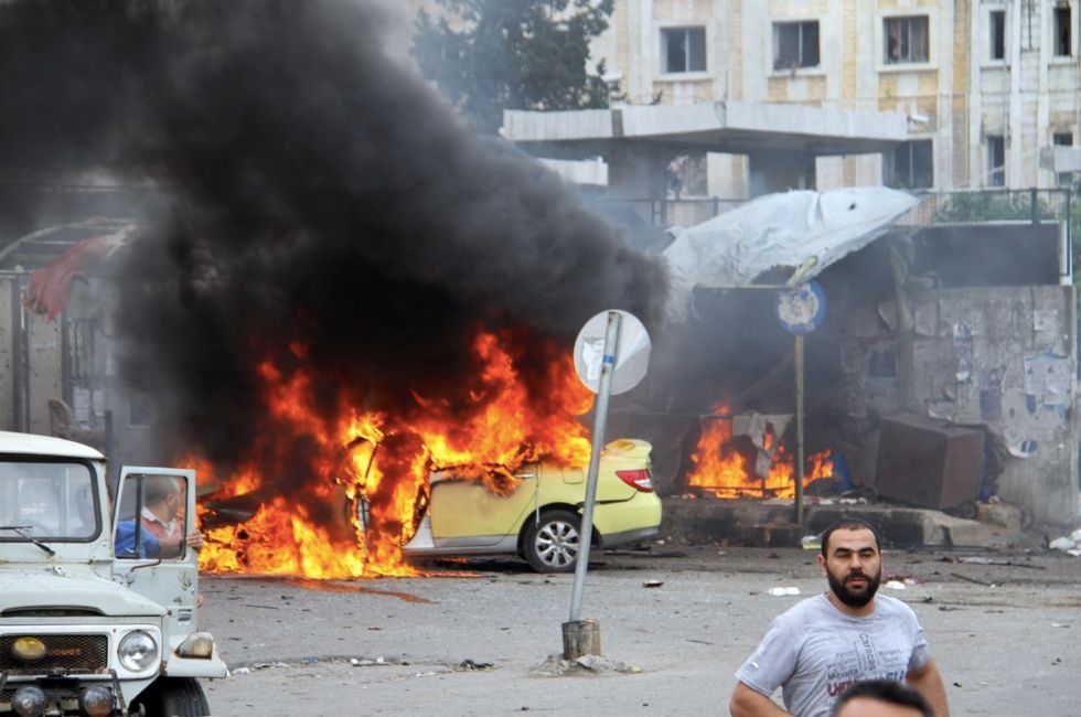 Islamic State Claims Responsibility for Multiple Blasts in Syria Government Strongholds That Kill Over 80, Wound 200