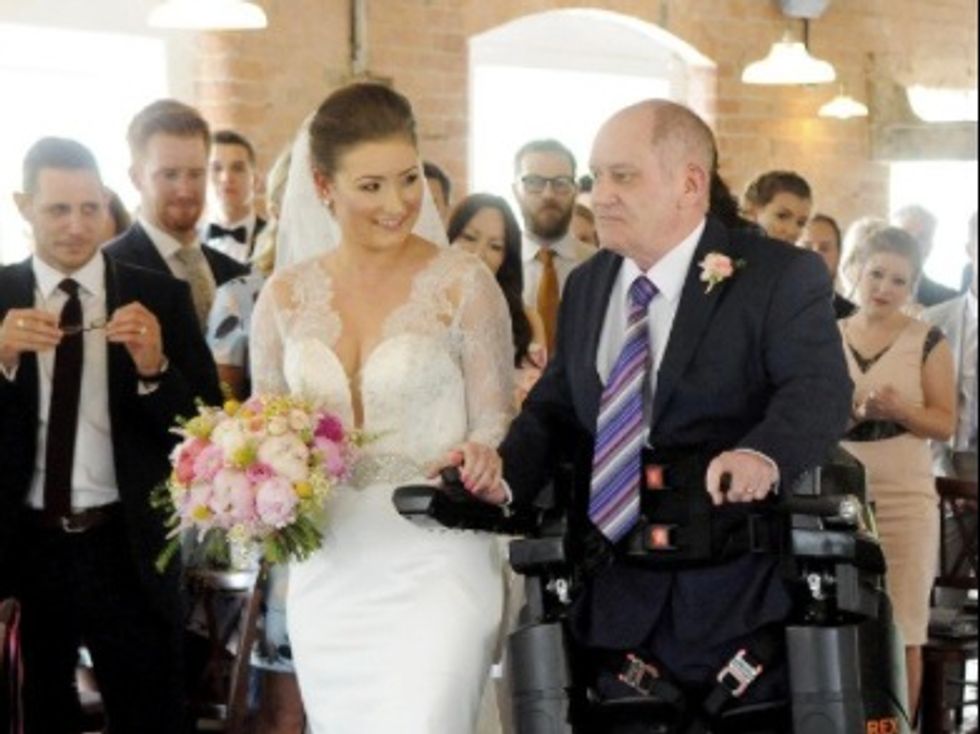 Not Even Paralysis Caused by Cancer Could Stop This Determined Dad From Walking His Daughter Down the Aisle