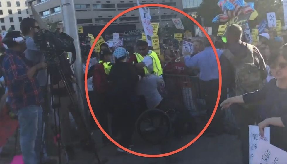 Protesters Caught on Video Tossing Water at Trump Supporter Outside Rally — and How He's Seated Makes All the Difference