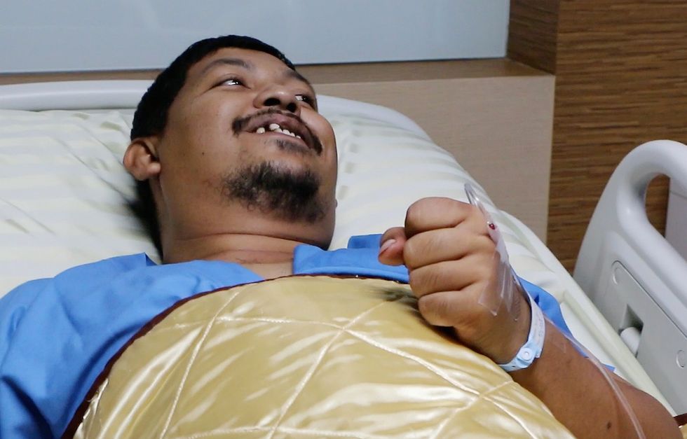 10-Foot-Long Snake Slithers Up Man’s Toilet and Latches Onto His Penis — for Half an Hour
