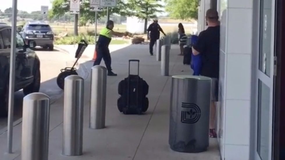 Tense Video Shows Moment Police Open Fire on Man Allegedly Throwing Rocks Outside Dallas Airport