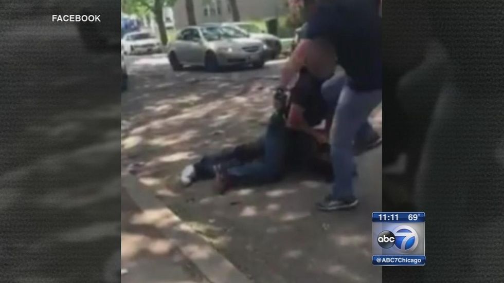 They Had Him Face Down': Chicago Police Investigate Video Appearing to Show Officer Kicking Man in Head