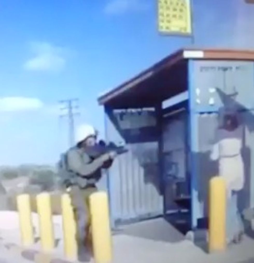 Watch the Dramatic Moment IDF Officers Shoot Palestinian Woman After She Tries to Stab Them at Bus Stop