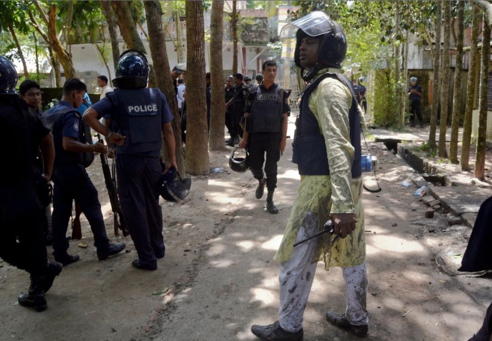 Two Police Officers Killed When Islamic Extremists Hurl Bomb During Muslim Prayer Service in Bangladesh