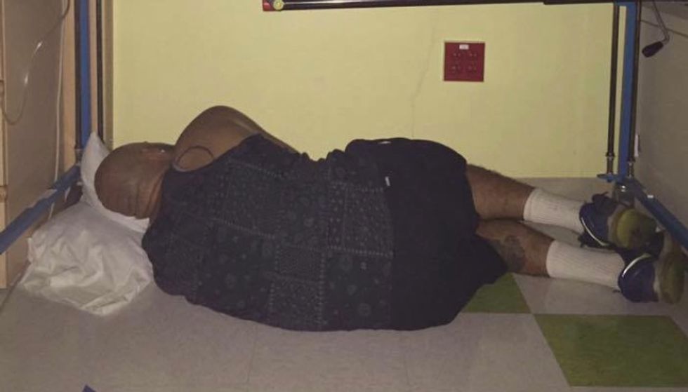 You'll Love Why This Photo of a Dad Sleeping Has Gone Viral 