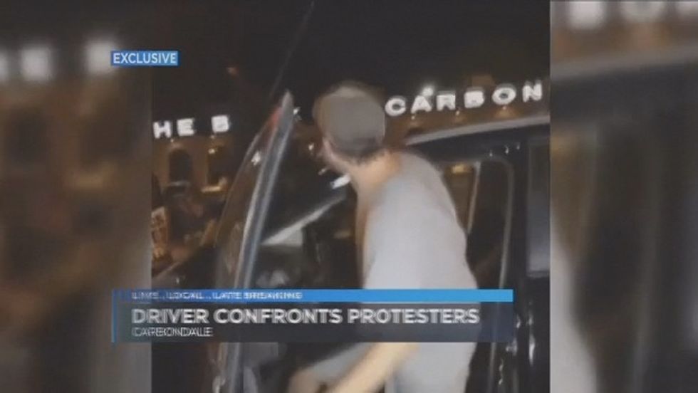 Motorist Sounds Off to Black Lives Matter Protestors Blocking Street. When They Surround His SUV, He Decides He's Had Enough.