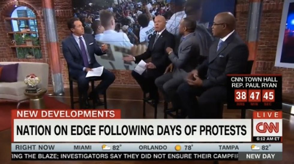 Retired NYPD Detective Is Asked if 'Black People Are Prone to Criminality.' CNN Panel Erupts at His Response.
