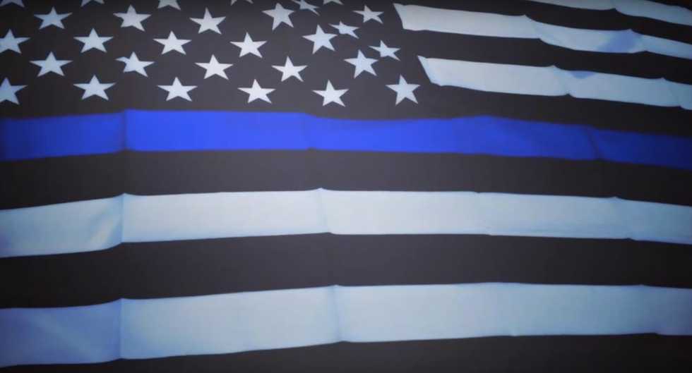 Firefighters Fly 'Thin Blue Line' American Flag From Engine to Honor Fallen Police. Then Their Superiors Find Out.